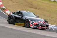 <p>A fresh version of Toyota's sports coupe was recently sighted undergoing testing at the Nürburgring Nordschleife. Cloaked in camouflage, it showcased a redesigned fixed rear wing, along with a modified front bumper featuring canards and a more aggressive lower lip. Beneath the hood, there are speculations that the GRMN Supra might feature the S58 engine from the BMW M2; this GRMN model should launch in early <strong>2025.</strong></p>