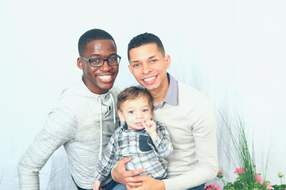 JaRel, left, and Aaron Clay with their son Noah. (Photo courtesy of Aaron Clay)