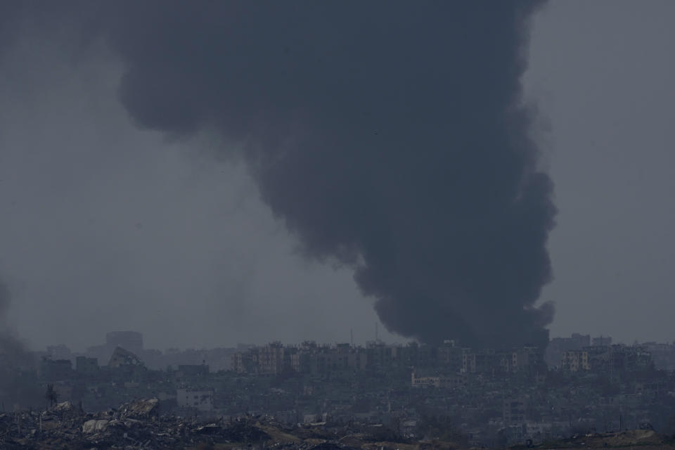 Smoke rises following an Israeli bombardment in the Gaza Strip, as seen from southern Israel,, Friday, Dec. 8, 2023. (AP Photo/Maya Alleruzzo)