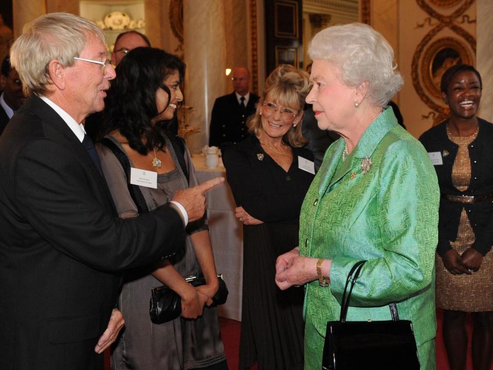 Queen Elizabeth II receives ‘Blue Peter’ presenter John Noakes (PA)