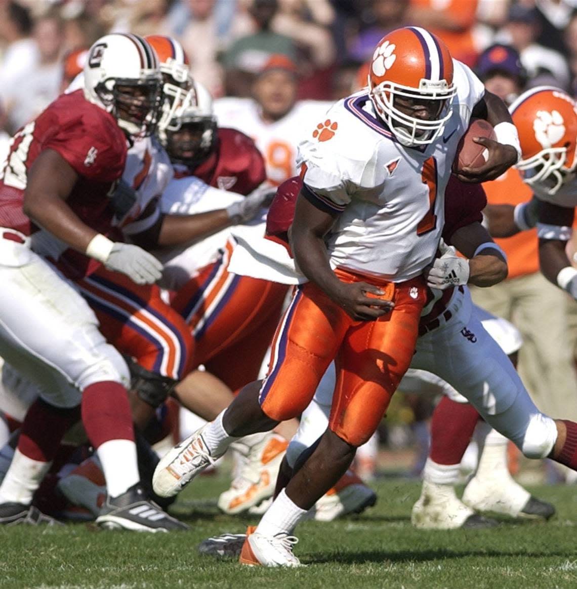 Clemson’s Woody Dantzler runs the ball against South Carolina on Nov. 17, 2001 at Williams-Brice Stadium.