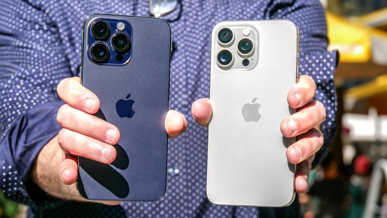  IPhone 15 Pro Max vs iPhone 14 Pro Max in hand. 