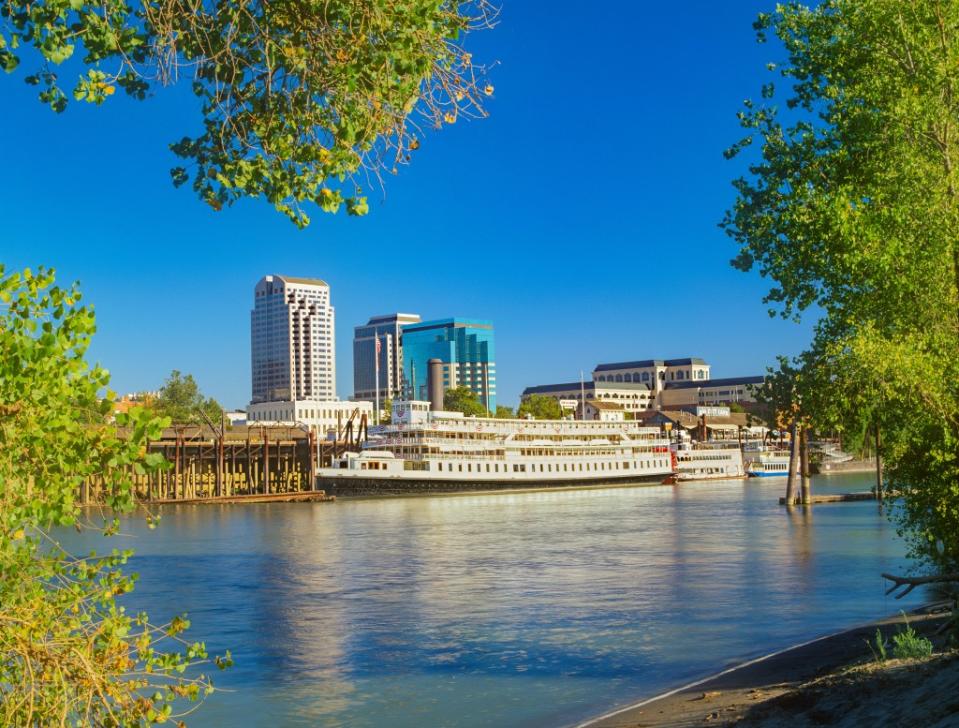 Historic Old Town Sacramento waterfront with riverboats and the Sacramento River,CA via Getty Images