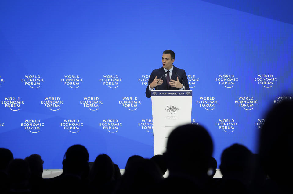 Spain Prime Minister Pedro Sanchez addresses the annual meeting of the World Economic Forum in Davos, Switzerland, Wednesday, Jan. 23, 2019. (AP Photo/Markus Schreiber)