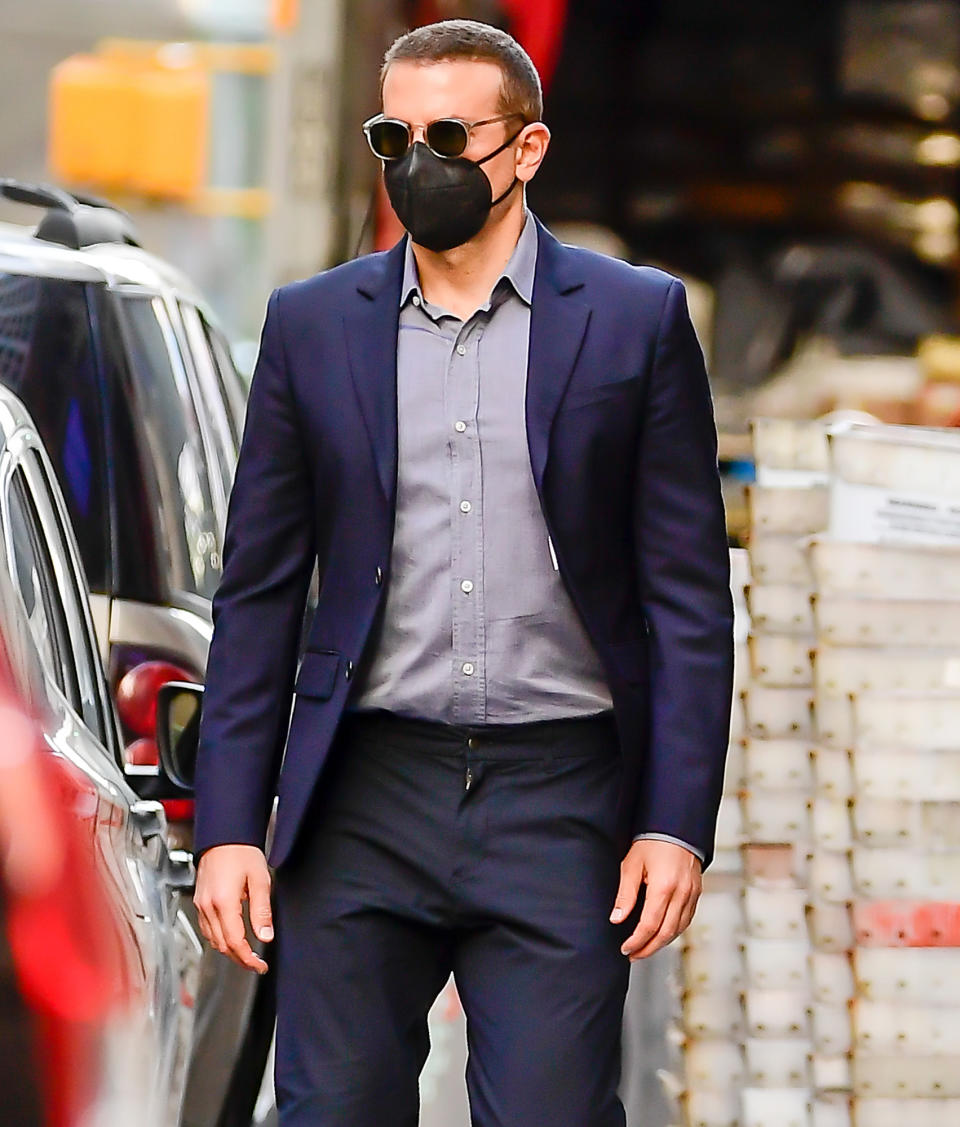 <p>Bradley Cooper keeps covered during an outing in N.Y.C. on Thursday.</p>