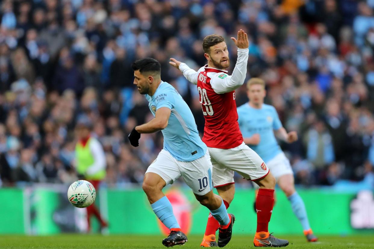 Caught out: Aguero gets away from Mustafi before scoring City’s opener at Wembley: Rex Features