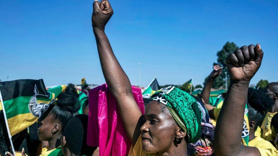 Supporters of the African National Congress (ANC) await the arrival of President of South Africa Cyril Ramaphosa during an ANC election rally on May 17, 2024 at the Lakhis Sports Ground in Greytown, KwaZulu-Natal, South Africa - May 17, 2024