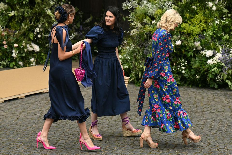 Guests continue to arrive for the special occasion (AFP via Getty Images)