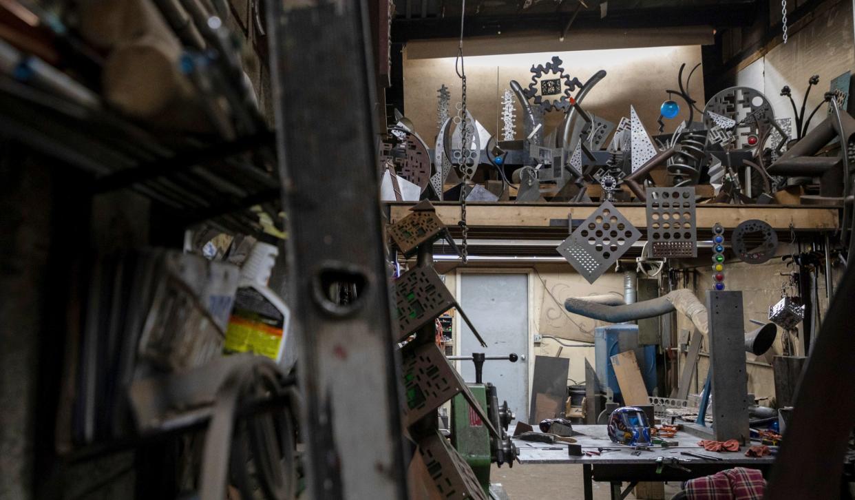 Multiple metal art pieces created by brothers Israel Nordin and Erik Nordin sit inside the Detroit Design Center in Detroit on Tuesday, April 11, 2023. 