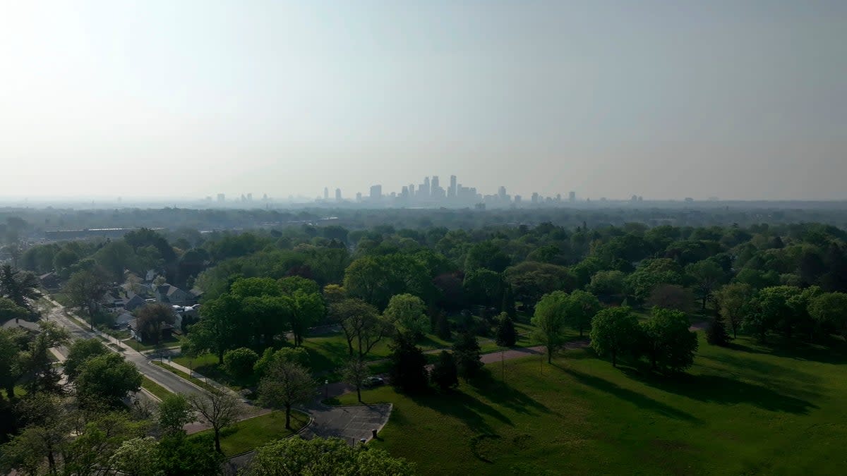 Wildfire smoke hangs over the Minneapolis skyline on Monday, May 13, 2024 (AP)