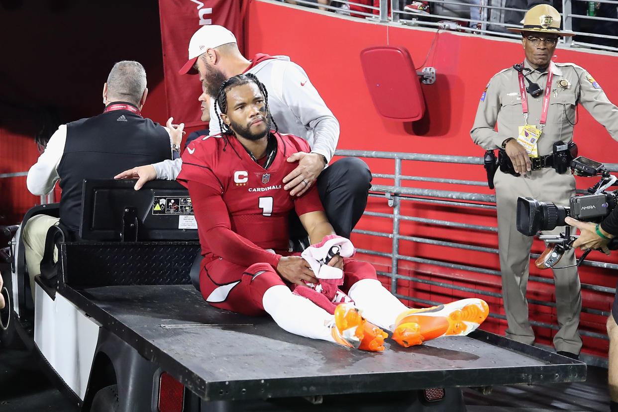 GLENDALE, ARIZONA - DECEMBER 12: Quarterback Kyler Murray #1 of the Arizona Cardinals is carted off the field after being injured against the New England Patriots during the first quarter of the game at State Farm Stadium on December 12, 2022 in Glendale, Arizona. (Photo by Christian Petersen/Getty Images)