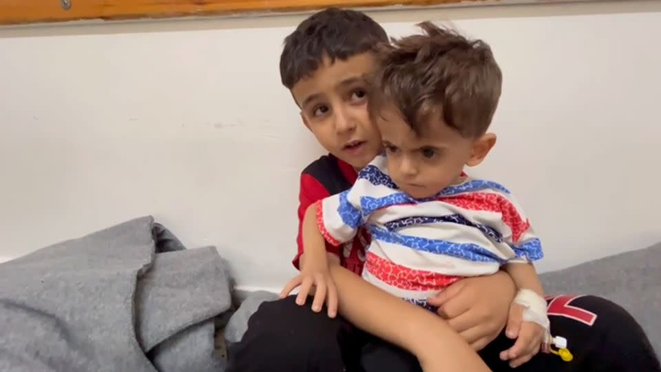 Brothers Amjad, aged 2, and Ahmad, aged 7, are shown in Nasser Hospital, southern Gaza, before their medical evacuation to Egypt. On Tuesday, the older Palestinian brother told CNN, "I don't want to die." - CNN