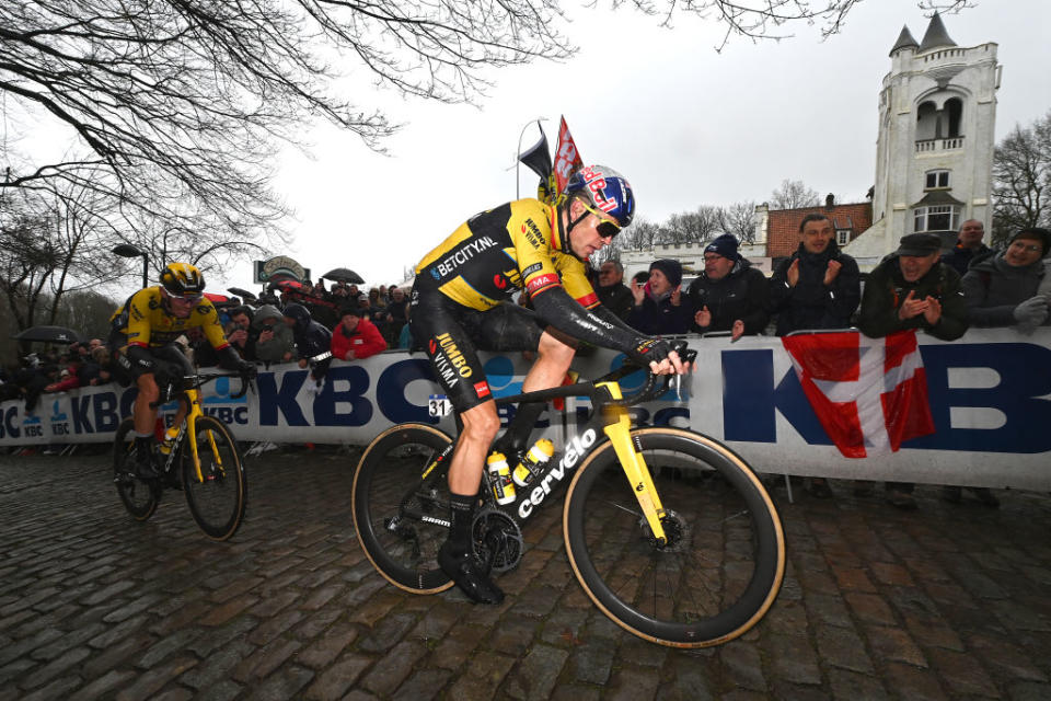 WEVELGEM BELGIUM  MARCH 26 LR Christophe Laporte of France and Wout Van Aert of Belgium and Team JumboVisma compete passing through a Kemmelberg cobblestones sector during the 85th GentWevelgem in Flanders Fields 2023 Mens Elite a 2609km one day race from Ypres to Wevelgem  UCIWT  on March 26 2023 in Wevelgem Belgium Photo by Tim de WaeleGetty Images