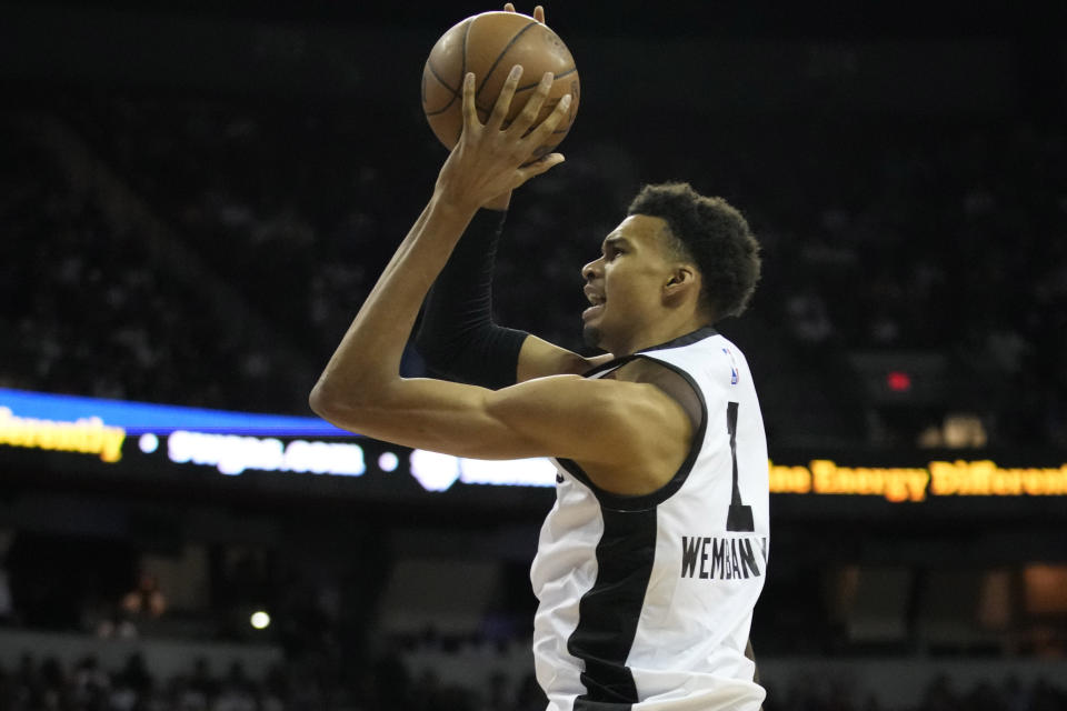 San Antonio Spurs' Victor Wembanyama shoots against the Charlotte Hornets during the first half of an NBA summer league basketball game Friday, July 7, 2023, in Las Vegas. (AP Photo/John Locher)