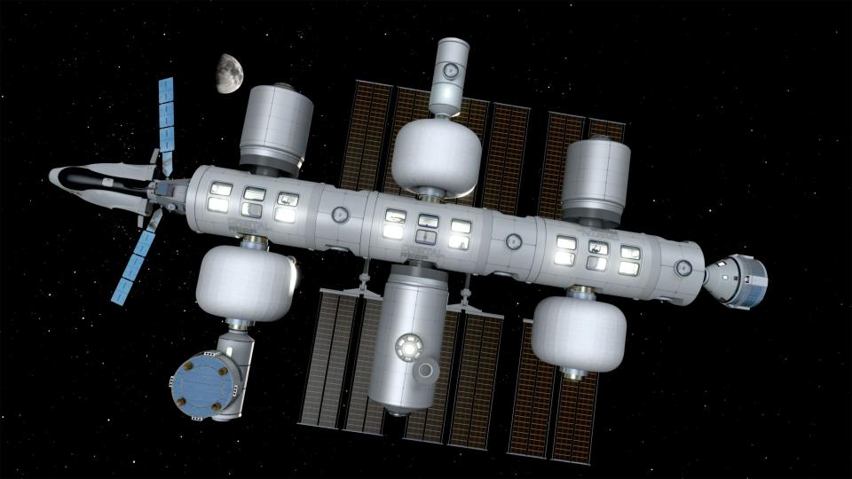 An artist rendering of the proposed Orbital Reef commercial space station with multiple commercial transportation capsules docked, including the Boeing Starliner.