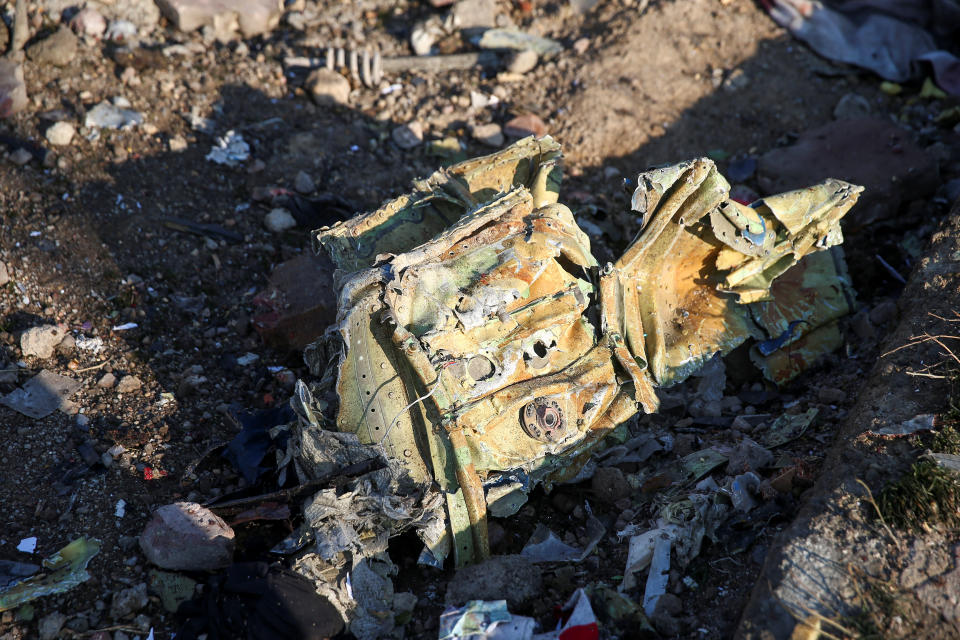 Debris of a plane belonging to Ukraine International Airlines, that crashed after taking off from Iran's Imam Khomeini airport, is seen on the outskirts of Tehran, Iran January 8, 2020. Nazanin Tabatabaee/WANA (West Asia News Agency) via REUTERS