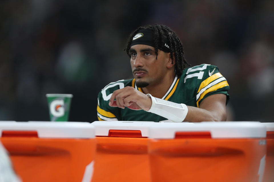 SAO PAULO, BRAZIL - SEPTEMBER 06: Jordan Love, number 10 of the Green Bay Packers, receives treatment on the sideline during the fourth quarter against the Philadelphia Eagles at Arena Corinthians on September 06, 2024 in Sao Paulo, Brazil. (Photo by Wagner Meier/Getty Images)