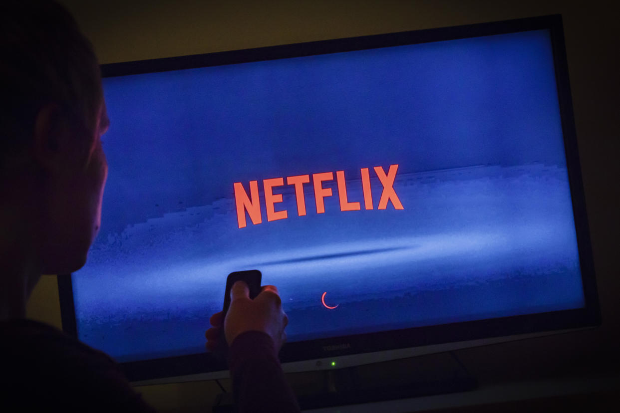 Netflix looking spooky in a dark room. (Photo: Thomas Trutschel via Getty Images)