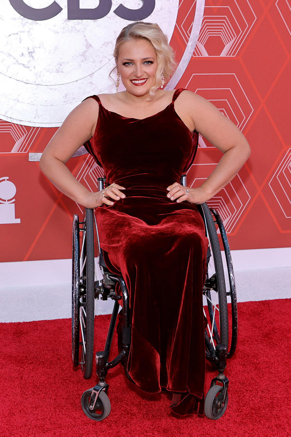 <p>Ali Stroker looks glam in a red velvet gown on the red carpet. </p>