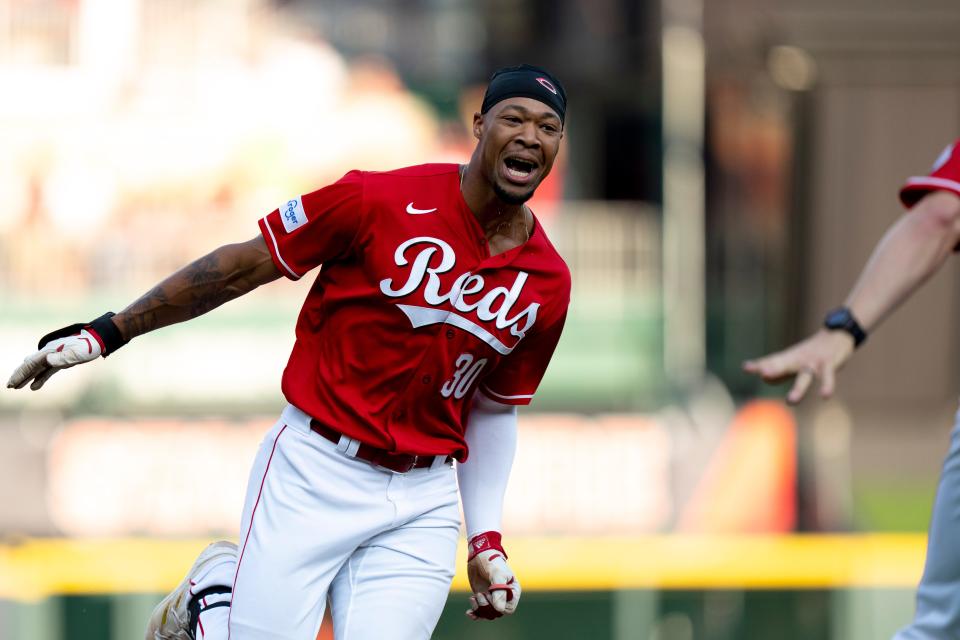 Cincinnati Reds left fielder Will Benson (30) celebrates after hitting a solo home run in the ninth inning of the MLB baseball game between the Cincinnati Reds and the Atlanta Braves at Great American Ball Park in Cincinnati on Saturday, June 24, 2023. 