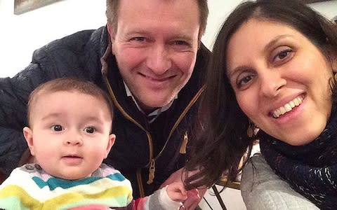  jailed British mother Nazanin Zaghari-Ratcliffe with her husband Richard Ratcliffe and their daughter Gabriella - Credit: PA