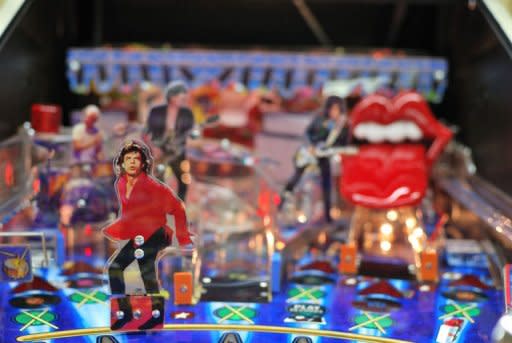 A close-up shot of the Rolling Stones pinball machine in the midst of assembly at Stern Pinball in Chicago on August 15, 2011. The machine has a Mick Jagger figurine which dances back and forth across the playfield blocking the ball, while the signature red lips and tongue perches on top of one of the ramps