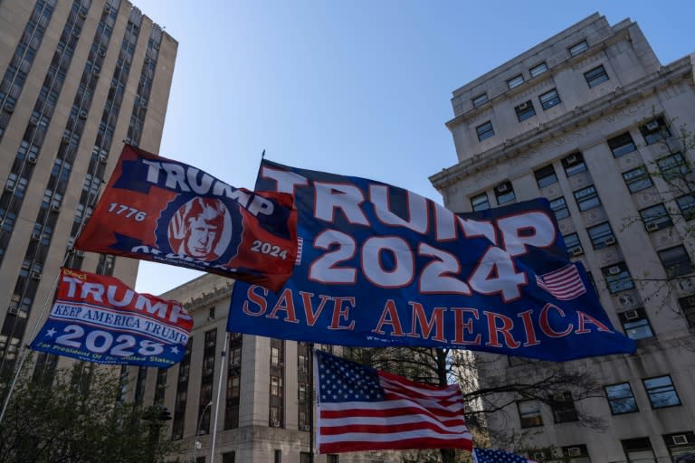 Flags in support of former US president Donald Trump outside of Manhattan Criminal Court (Adam Gray)