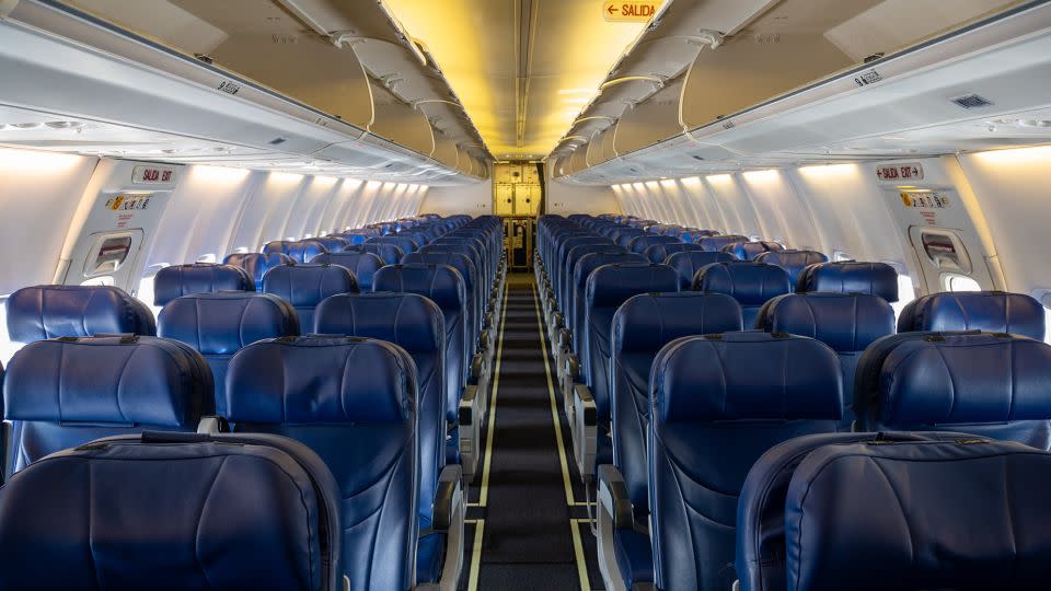 Anyone trying to climb into the airplane luggage compartment could cause injury to themselves or others. - Richard Sharrocks/Moment RF/Getty Images