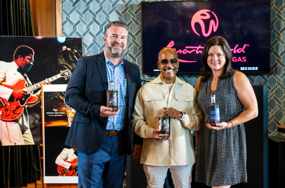 Justin Stiefel, CEO and Co-Founder of Heritage Distilling, Vassal Benford and Jennifer Stiefel, President and Co-Founder of Heritage Distilling.
