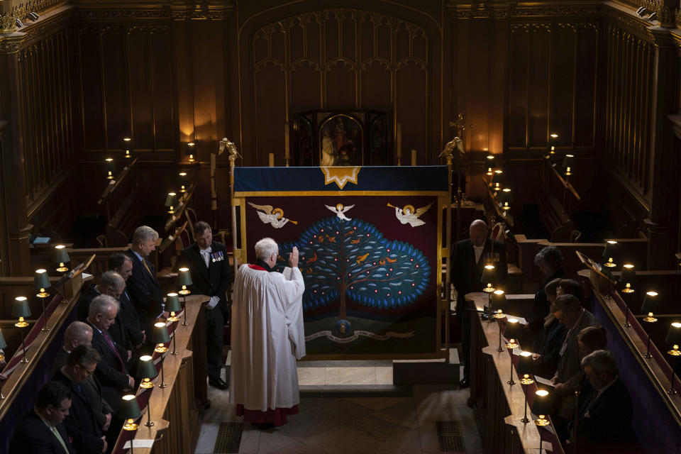 FILE - The anointing screen which will be used in the coronation of Britain's King Charles III is blessed in front of a small congregation, in the Chapel Royal at St James's Palace in London, Monday, April 24, 2023. Britain’s royal family turns the page on a new chapter Saturday, May 6, 2023 with the coronation of King Charles III. During the service conducted by the church's spiritual leader, the archbishop of Canterbury, Charles will be anointed with oil. (Victoria Jones/Pool Photo via AP, File)