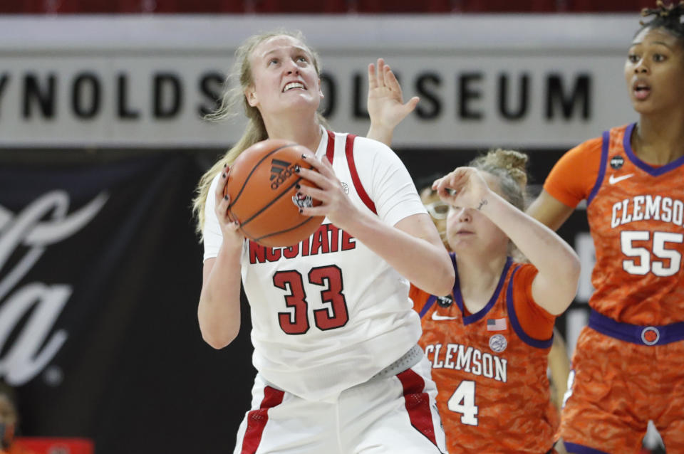 North Carolina State's Elissa Cunane (33) prepares to shoot against Clemson during the first half of an NCAA college basketball game at Reynolds Coliseum in Raleigh, N.C., Thursday, Feb. 11, 2021. (Ethan Hyman/The News & Observer via AP)