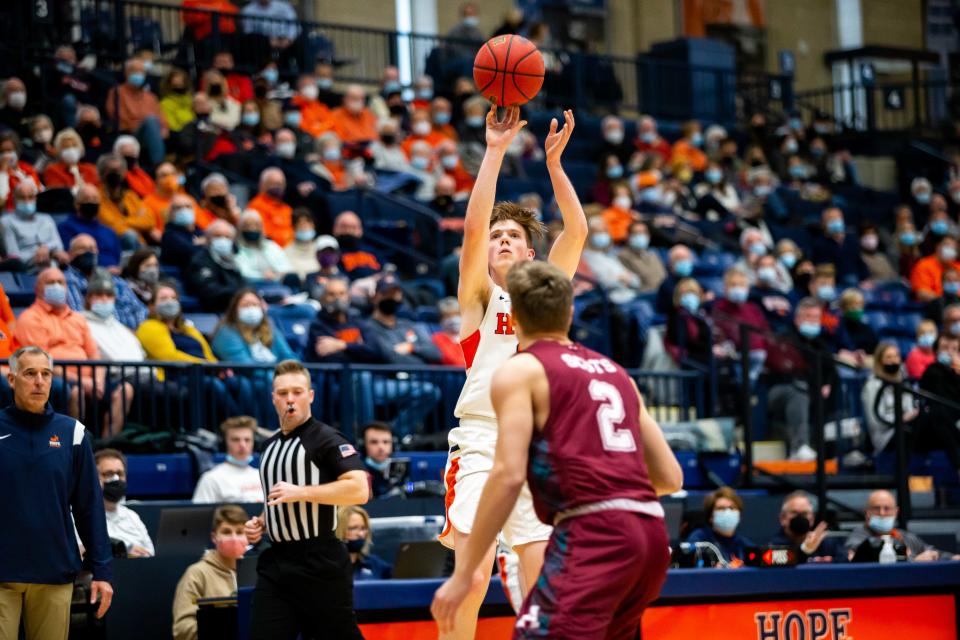 Hope's Brady Swinehart takes a shot from beyond the arc during a game against Alma Saturday, Jan. 22, 2022, at DeVos Fieldhouse. 
