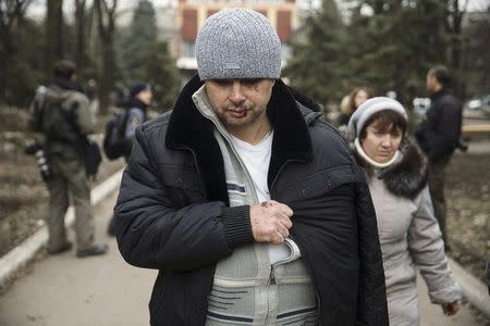 Sergei Baldayev, a miner injured in a mine blast, is seen after after receiving medical aid at the Zasyadko coal mine in Donetsk March 4, 2015. REUTERS/Baz Ratner