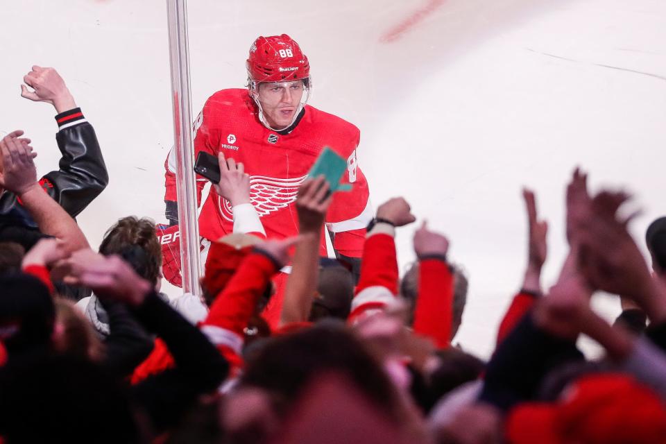 Detroit Red Wings right wing Patrick Kane (88) celebrates a goal against Buffalo Sabres during the first period at Little Caesars Arena in Detroit on Sunday, April 7, 2024.