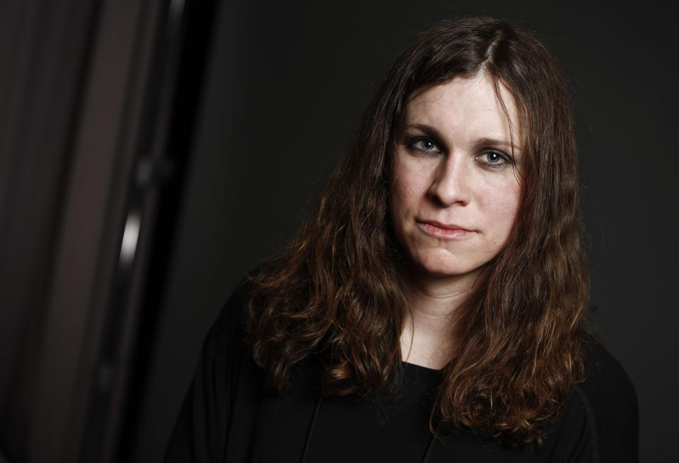 This Jan. 10, 2014 photo shows Laura Jane Grace, formerly known as Tom Gabel, of the band Against Me!, in New York. Grace, 33, publicly came out as transgender in 2012. She was born Tom Gabel and performed with the Florida-based band since 1997. The group’s latest album, “Transgender Dysphoria Blues,” a concept record about a transgender prostitute, marked a chart high for the band when it reached No. 23 on the Billboard 200 albums chart in late January. (Photo by Brian Ach/Invision/AP)