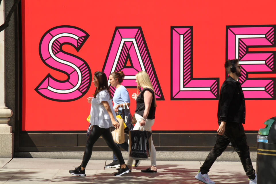  Shoppers walk past a SALE sign at the Sefrdiges store amid coronavirus crisis.
Londoners have slowly began to go back to 'normal' with shops reopened on Oxford Street. This week the government has advised on the opening of gyms and pools from 11 July. (Photo by David Mbiyu / SOPA Images/Sipa USA) 