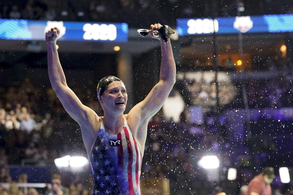 Annie Lazor reacts after winning the women's 200 breaststroke during wave 2 of the U.S. Olympic Swim Trials on Friday, June 18, 2021, in Omaha, Neb. (AP Photo/Jeff Roberson)