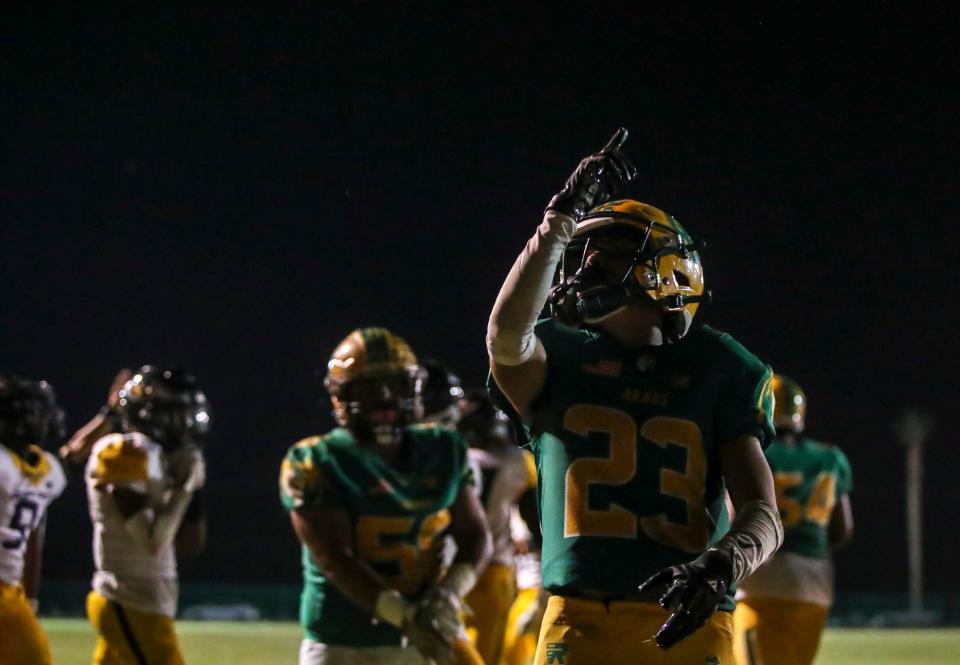 Coachella Valley's Aaron Ramirez (23) celebrates a touchdown during the third quarter of their game at Coachella Valley High School in Thermal, Calif., Friday, Sept. 22, 2023.