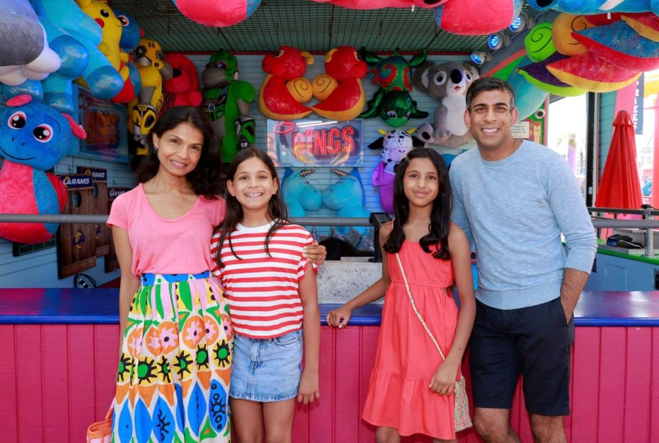 Rishi Sunak, his wife Akshata Murty and daughters Anoushka and Krishna in Santa Monica (AP)