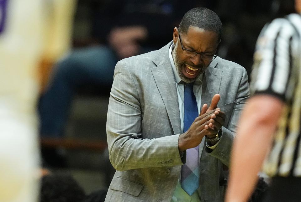 Ben Davis Giants head coach Don Carlisle yells in excitement during the game against the Brownsburg Bulldogs on Saturday, March 18, 2023 at New Castle Fieldhouse in New Castle. The Ben Davis Giants defeated the Brownsburg Bulldogs, 66-38, for the IHSAA Class 4A Semistate championship game. 