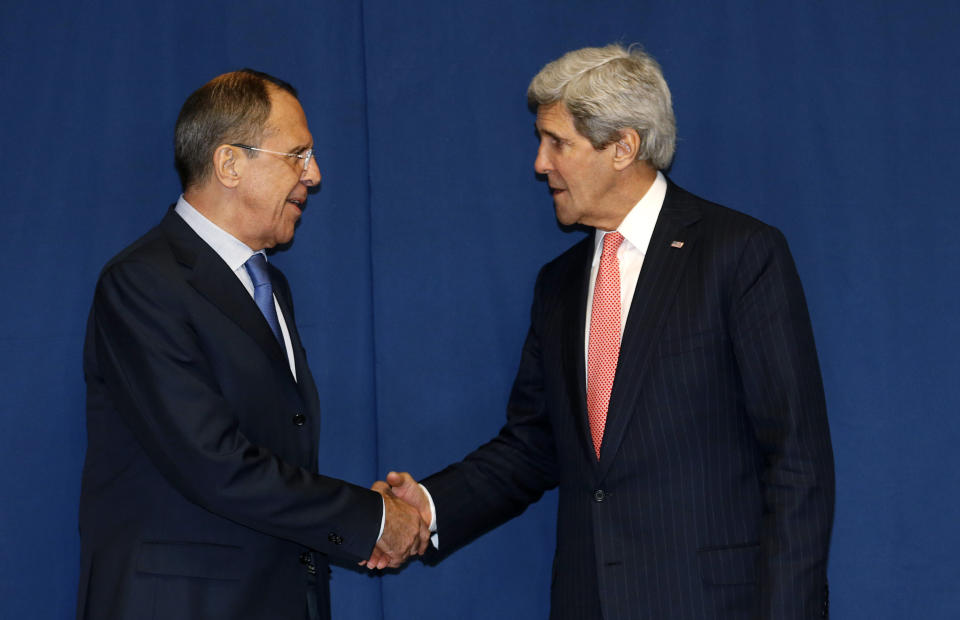 Secretary of State John Kerry shakes hands with Russian Foreign Minister Sergey Lavrov during a meeting to discuss the Ukraine crisis, Thursday, March 6, 2014, at the Conference on International Support to Libya, in Rome. It is the second meeting in as many days between Kerry and Lavrov, who met in Paris on Wednesday to talk about the crisis over the crisis in Ukraine's Crimea Peninsula. (AP Photo/Kevin Lamarque, Pool)