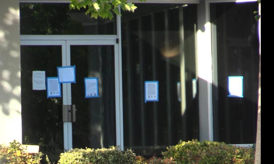 Fliers shown here that is heavily taped on a few of the Temple Beth Israel windows and glass door that contains religious content, along with a QR code on Thursday, May 2, 2024.