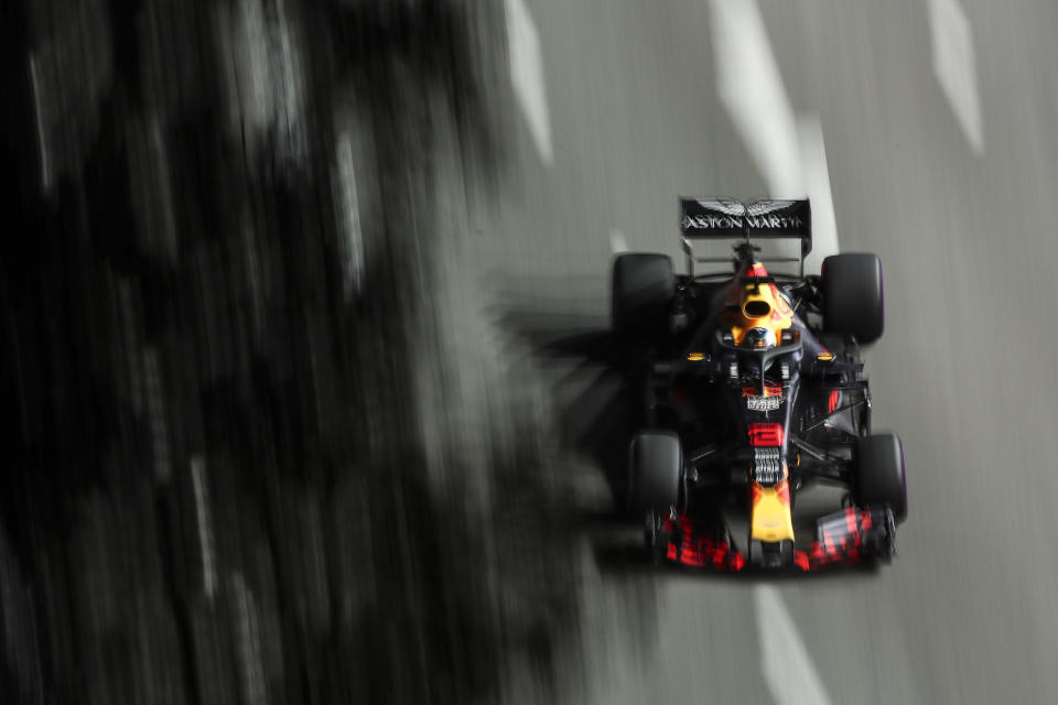 Red Bull Racing driver Daniel Ricciardo of Australia steers his car during second practice at the Marina Bay City Circuit ahead of the Singapore Formula One Grand Prix in Singapore, Friday, Sept. 14, 2018. (AP Photo/Yong Teck Lim)