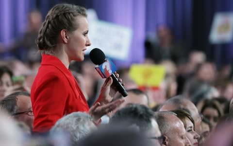 TV presenter Ksenia Sobchak asks a question during an annual press conference by Russia's President Vladimir Putin at Moscow's World Trade Center  - Credit:  TASS