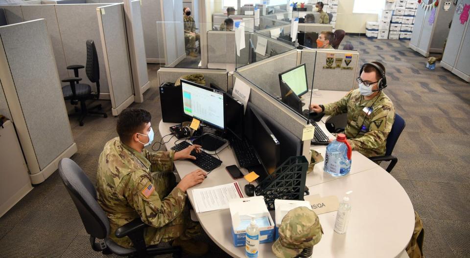 <span class="caption">Arizona National Guard members conduct exposure notification calls.</span> <span class="attribution"><a class="link " href="https://www.flickr.com/photos/thenationalguard/50062753716" rel="nofollow noopener" target="_blank" data-ylk="slk:Tech. Sgt. Michael Matkin/Air National Guard;elm:context_link;itc:0;sec:content-canvas">Tech. Sgt. Michael Matkin/Air National Guard</a>, <a class="link " href="http://creativecommons.org/licenses/by/4.0/" rel="nofollow noopener" target="_blank" data-ylk="slk:CC BY;elm:context_link;itc:0;sec:content-canvas">CC BY</a></span>