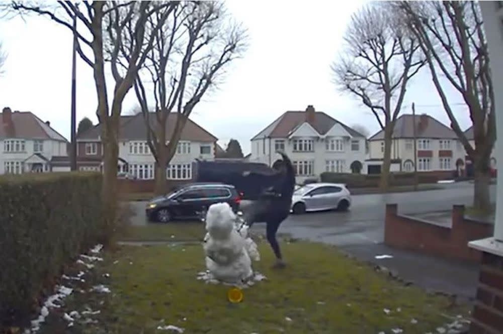 A family were left stunned after footage from their doorbell camera footage revealed a man had got out of his car and kicked down a snowman built by a nine-year-old girl. 

The furious mum and dad, from Dudley, West Midlands, assumed the snowman, built during this week's wintry conditions, had fallen over on its own.

Caption: A man kicking apart a snowman in Dudley, West Midlands