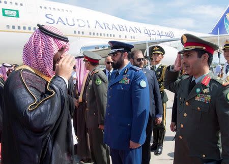 Saudi Arabia's Deputy Crown Prince Mohammed bin Salman (L) is welcomed upon arrival in Beijing, China August 29, 2016. Bandar Algaloud/Courtesy of Saudi Royal Court/Handout via REUTERS