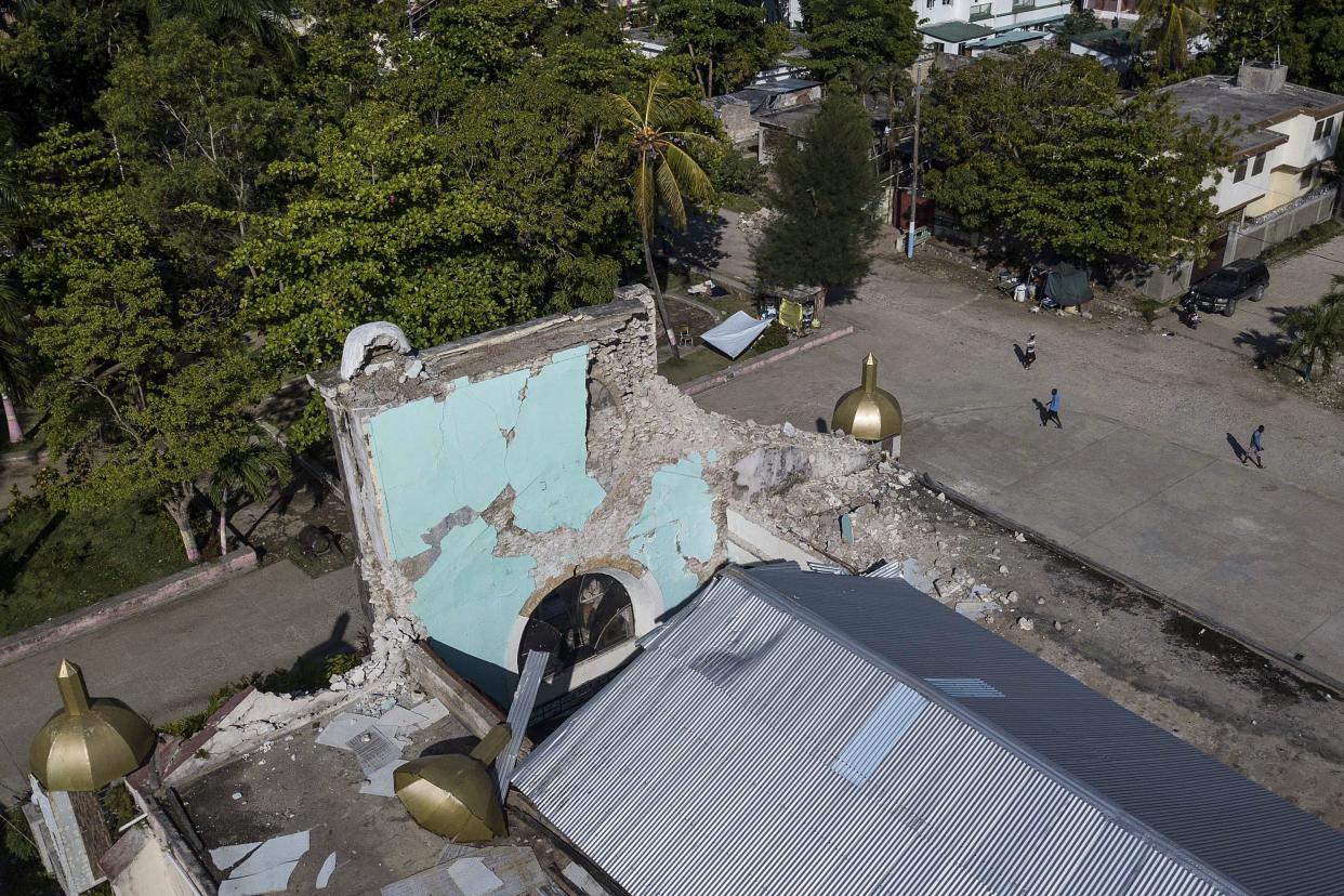 A Catholic church is damaged in Saint-Louis-du-Sud, Haiti on Monday, Aug. 16, 2021, two days after a 7.2-magnitude earthquake struck the southwestern part of the country.