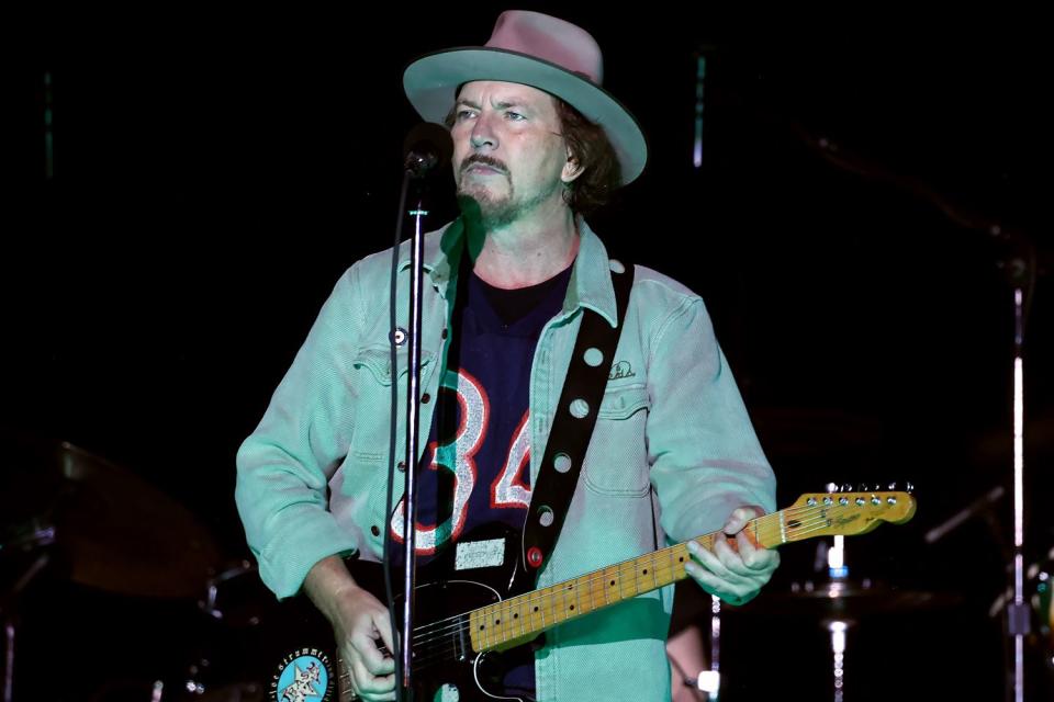 <p>Kevin Mazur/WireImage</p> Eddie Vedder of Pearl Jam performs in Napa, California in May 2024