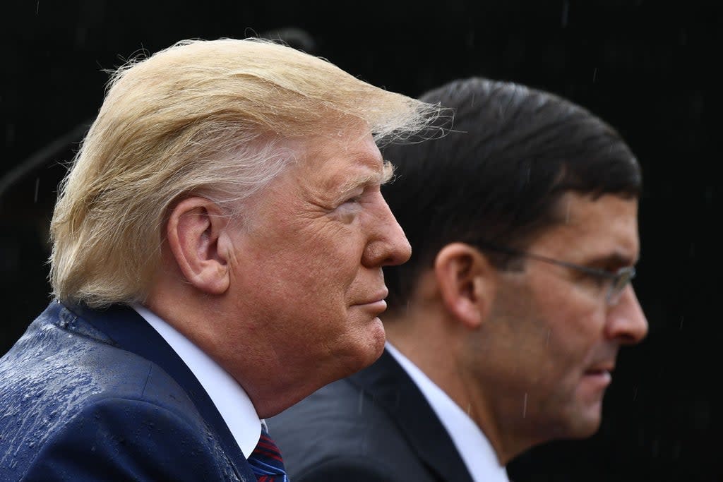 File: Donald Trump and US secretary of defense Mark Esper attend the Armed Forces Welcome Ceremony in honor of the Twentieth Chairman of the Joint Chiefs of Staff at Summerall Field (AFP via Getty Images)